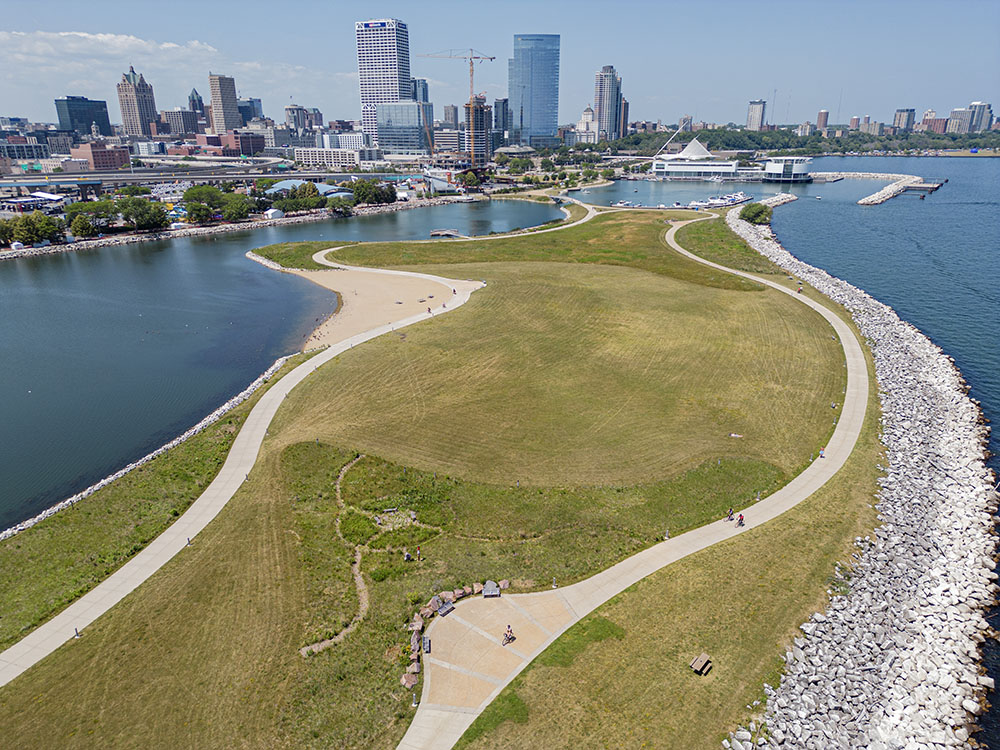 The site of the proposed Visitor and Education Center is in the narrow portion of the island at the top of the image in this aerial perspective.