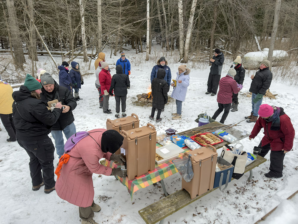 After-hike refreshments include hot chocolate, coffee, cookies and...