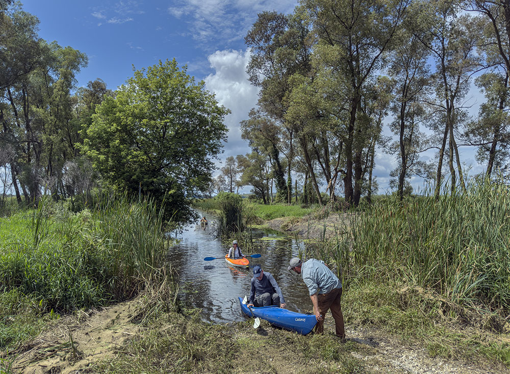 Disembarking at the end point boat launch after a five-mile, four-hour paddle.