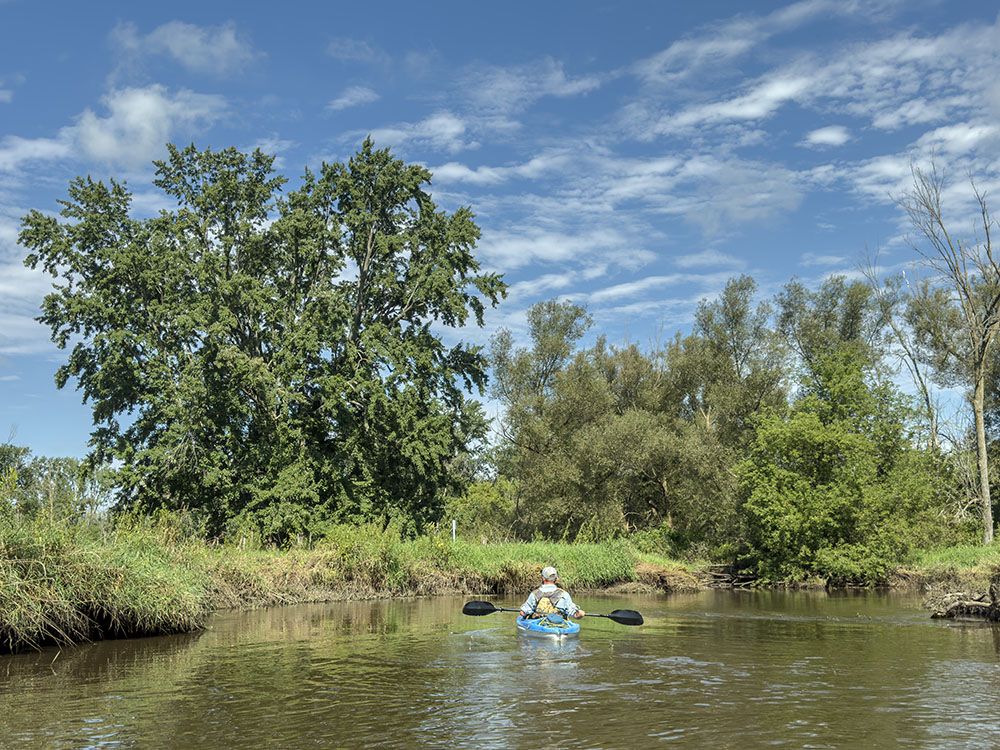 Rock River idyll. A solitary kayaker on the Rock River.