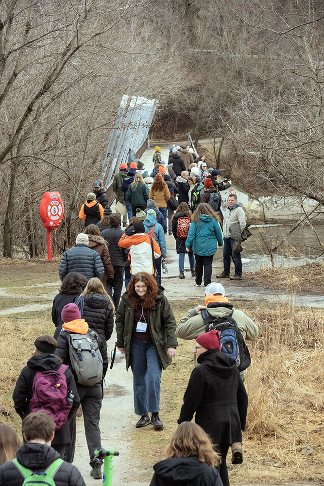 The pedestrian bridge over the Milwaukee River atop the former dam.
