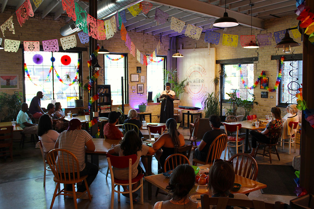 In 2021 I partnered with Escuela Verde to open and run Newline Community Cafe. The coffee shop, is not only a student-run enterprise but acts as a creative community hub, offering flexible public space that adapt to the unique needs of the neighborhood and the school. This picture shows the cafe being used for an Open Mic, one of many different events and programs the space has hosted.