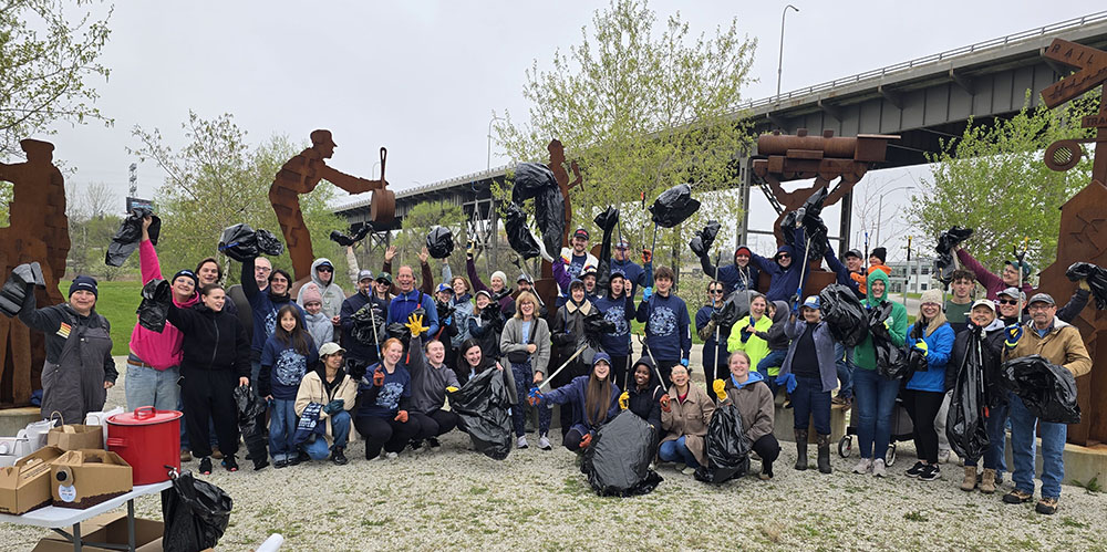 A crew of volunteers at the Chimney Park site in the Menomonee River Valley. 