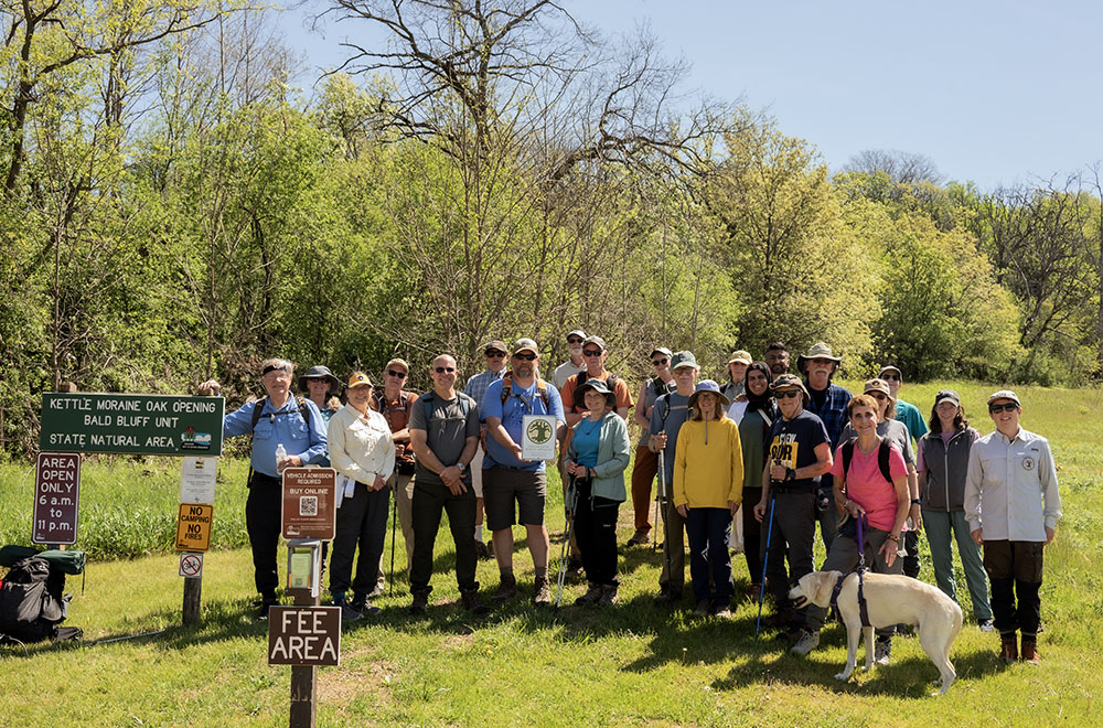 Two hiking groups assembled at the Bald Bluff trailhead in the Kettle Moraine Oak Opening State Natural Area.