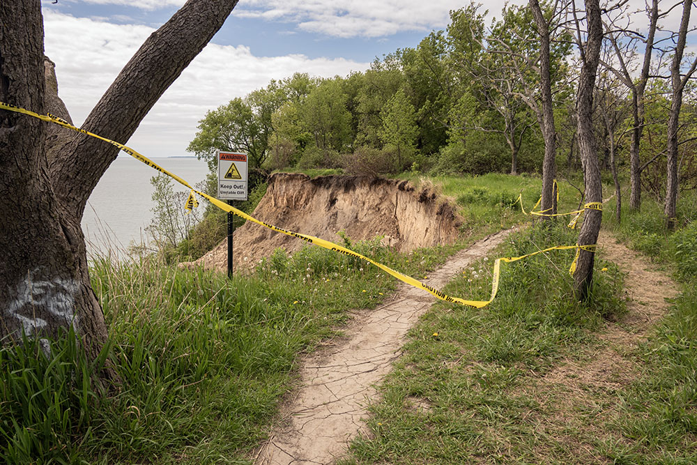 A recent collapse in Warnimont Park threatens the Forked Aster Trail, requiring a detour away from the edge.