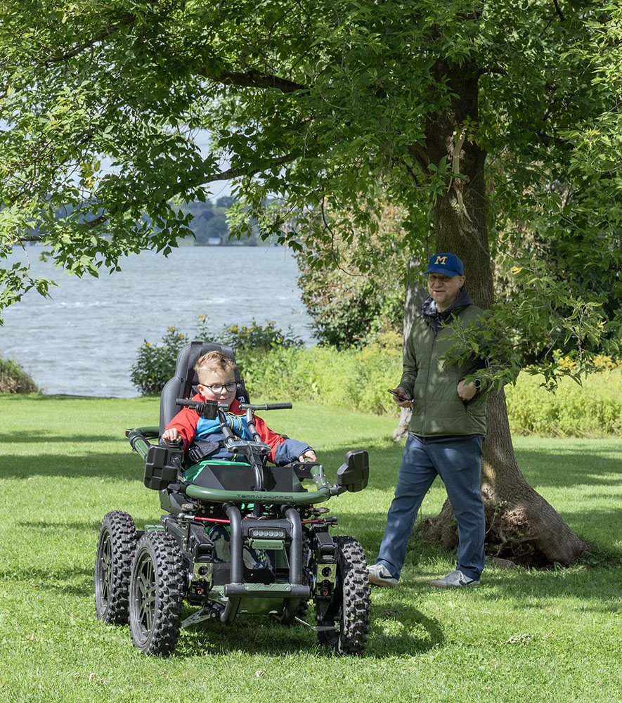 A youngster opts for an adaptive ATV.