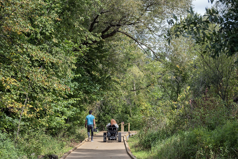 The accessible boardwalk running alongside the lake.
