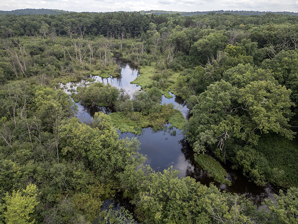 If there is a Mukwonago River wilderness, this seems to be the heart of it! A Waukesha County-owned undesignated property that fills a gap in the protection of the river. It is surrounded on three sides by the Kettle Moraine State Forest. There is a small parking lot off Hwy LO and a paved drive leading into it. The only trails are rudimentary, though, as it's not developed for recreation.