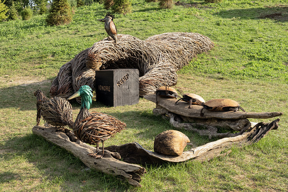 A grouping of animals "released" by the Sacred Rhythm Mother, including mink, mallard, kingfisher, turtles, and muskrat.