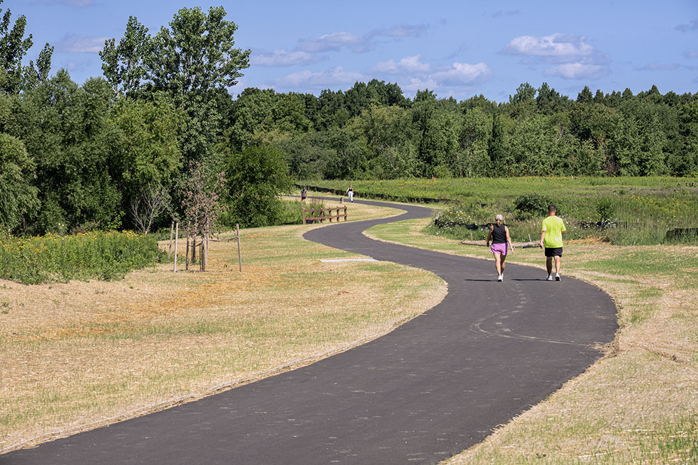 The disturbed edges along the trail were being reseeded with native prairie vegetation and protected with biodegradable burlap.
