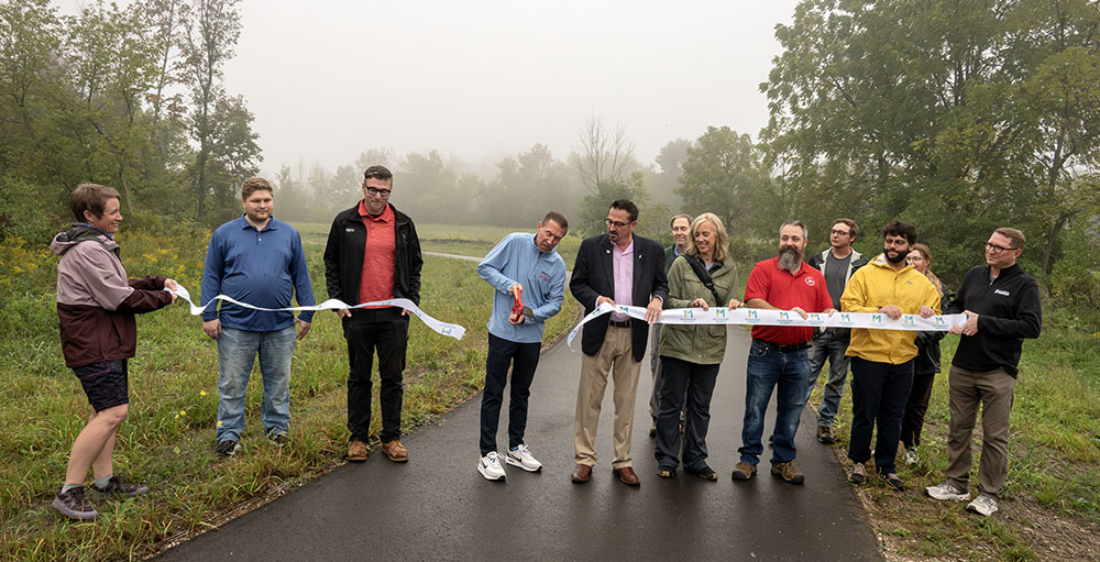 Milwaukee County Official cut a ribbon to officially open the new segment of the Oak Leaf Trail in Bender Park