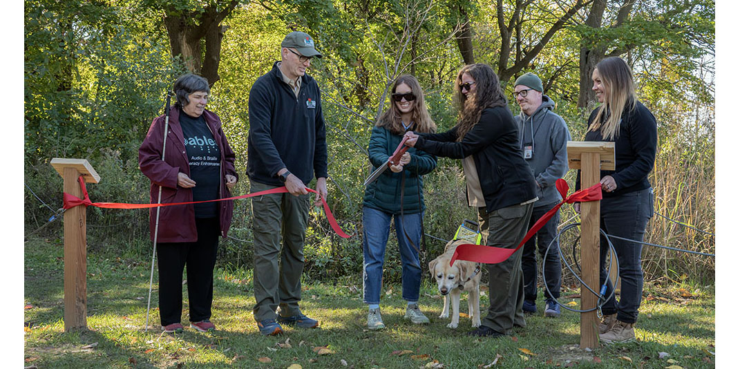 The ribbon cutting at the opening of the new braille trail at Havenwoods State Forest
