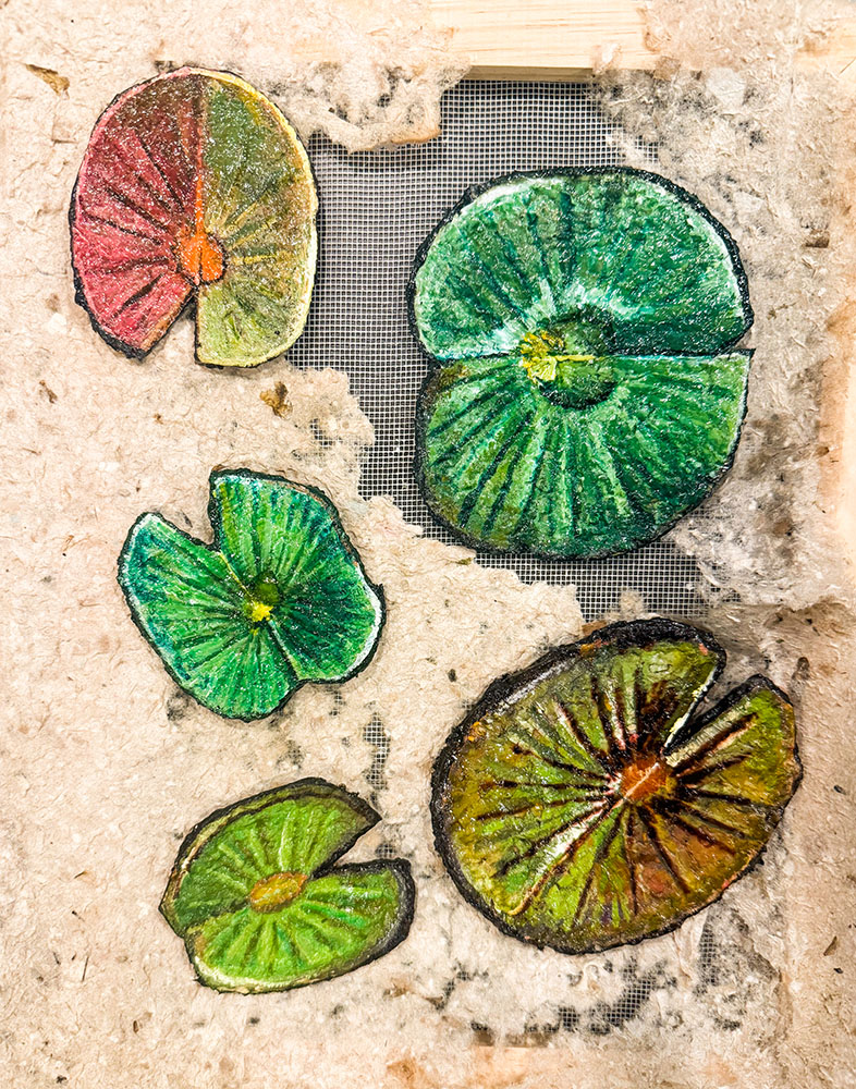 Finished and epoxied lily pads 2, mixed media on hand-made paper.